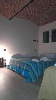 Letto o letti in una camera di B&B Casa Pascolone