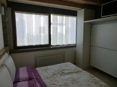 Letto o letti in una camera di B&B Le Peschiere