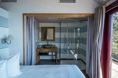 Letto o letti in una camera di Sesta Terra Natural Resort