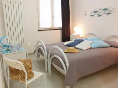 Letto o letti in una camera di Le Onde