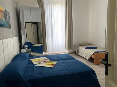 Letto o letti in una camera di Eden Hotel