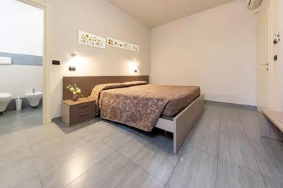 Letto o letti in una camera di La Vecchia Tramvia