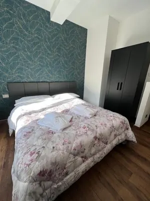 Letto o letti in una camera di Hotel Brenta