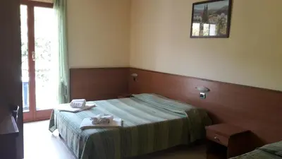 Letto o letti in una camera di Hotel Residence Moneglia