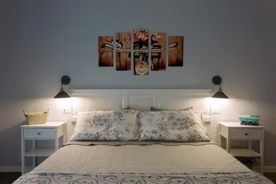 Letto o letti in una camera di La Bicicletta Rooms