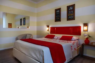 Letto o letti in una camera di La Bicicletta Rooms