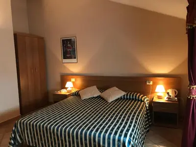 Letto o letti in una camera di Locanda Ca’ Rossa