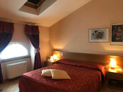 Letto o letti in una camera di Locanda Ca’ Rossa