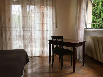 Area soggiorno di Affittacamere Room ospedale Maggiore