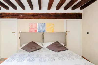 Letto o letti in una camera di PALAZZO CORDERO APARTMENT