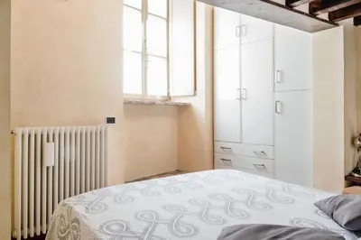 Letto o letti in una camera di PALAZZO CORDERO APARTMENT