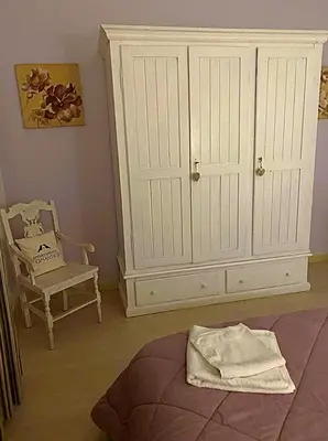 Letto o letti in una camera di Appartamento Romantico