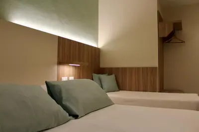 Letto o letti in una camera di Albergo Degli Amici