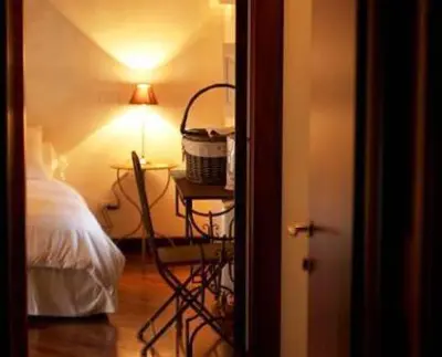 Letto o letti in una camera di B&B Casa del Teatro