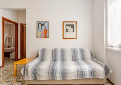 Letto o letti in una camera di Casa gli Scogli