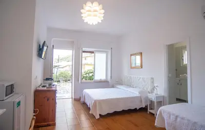 Letto o letti in una camera di Villa Mori