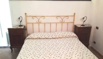 Letto o letti in una camera di Le Conchiglie
