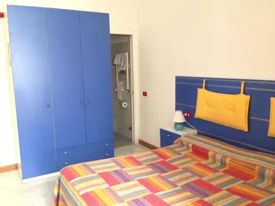 Letto o letti in una camera di Le Conchiglie