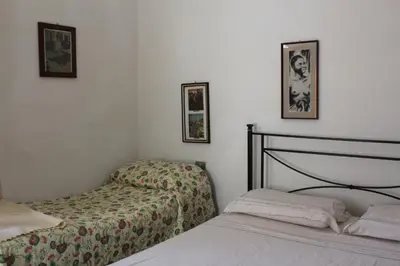Letto o letti in una camera di Il Capriolo