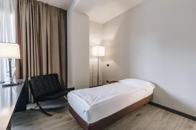 Letto o letti in una camera di Hotel Continental