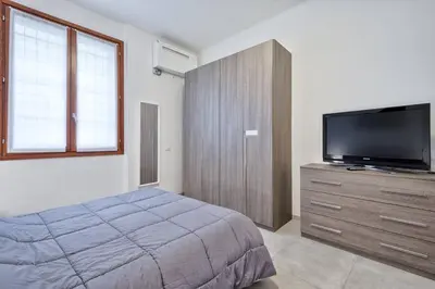 Letto o letti in una camera di BellaMantova 2