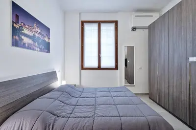 Letto o letti in una camera di BellaMantova 2