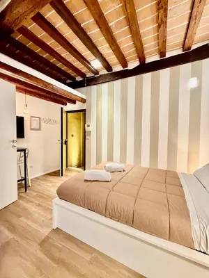 Letto o letti in una camera di Masone Home