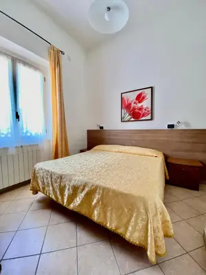 Letto o letti in una camera di Locanda Da Marco