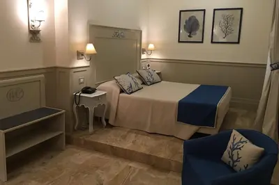 Letto o letti in una camera di Hotel La Colonnina