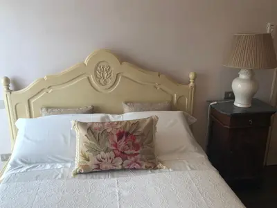 Letto o letti in una camera di il corbezzolo - Suite