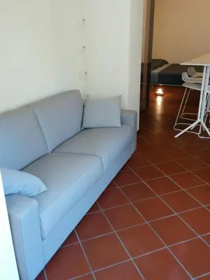 Area soggiorno di Honey House Parma