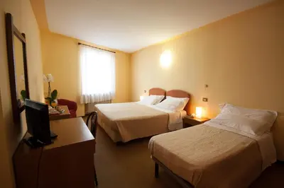 Letto o letti in una camera di Hotel San Marco