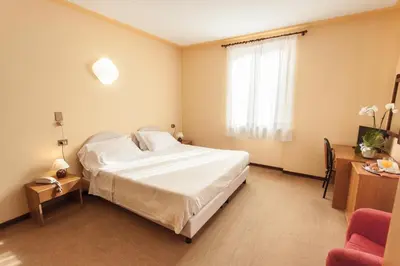 Letto o letti in una camera di Hotel San Marco