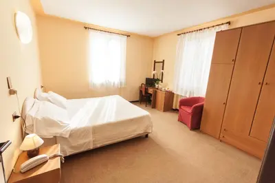 Letto o letti in una camera di Hotel San Marco