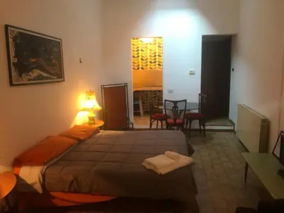 Letto o letti in una camera di Mood-Cavour