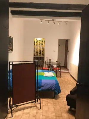 Letto o letti in una camera di Mood-Cavour