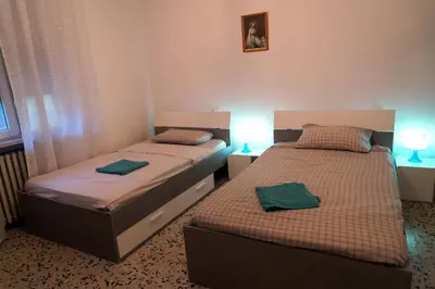Letto o letti in una camera di NOEMI & JULIENNE