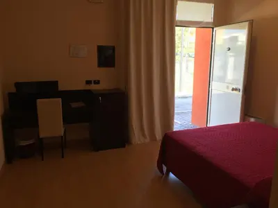 Letto o letti in una camera di Hotel Motel Galaxy Reggio Emilia