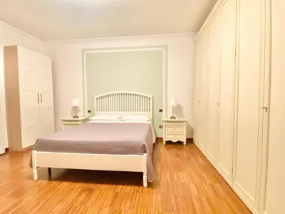 Letto o letti in una camera di B&B STAZIONE DON CAMILLO
