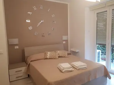 Letto o letti in una camera di Le camere di Sabrina con bagno in camera