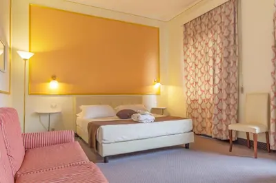 Letto o letti in una camera di Hotel Ponte di Rialto