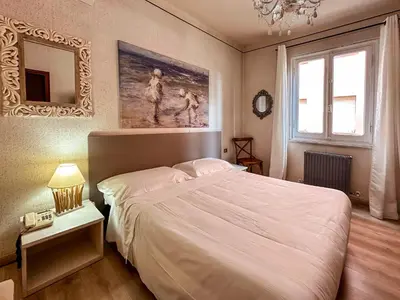 Letto o letti in una camera di Hotel Alba