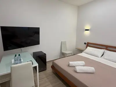 Letto o letti in una camera di Affittacamere La Casa Del Tiglio