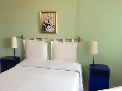 Letto o letti in una camera di Ai Pastelli