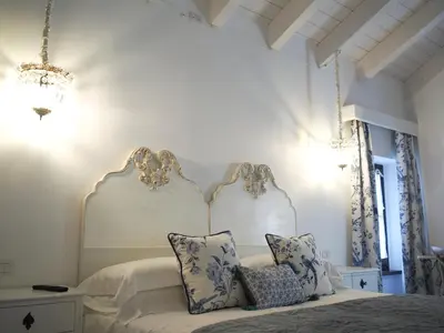 Letto o letti in una camera di Le Sei Dame