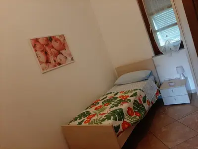 Letto o letti in una camera di La casetta di Bianca