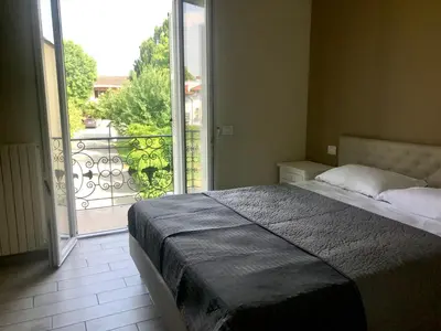 Letto o letti in una camera di L’infinito residence