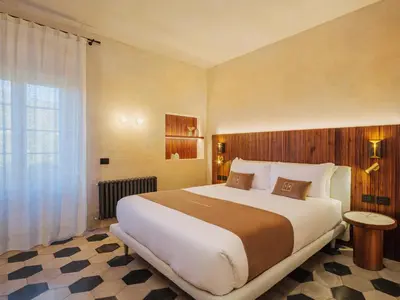 Letto o letti in una camera di Villa Riviera Resort