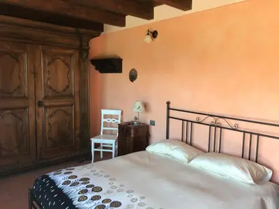 Letto o letti in una camera di Il Paradiso monolocale Cottage