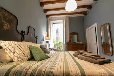 Letto o letti in una camera di Il Balcone dell'Angiol d 'Or